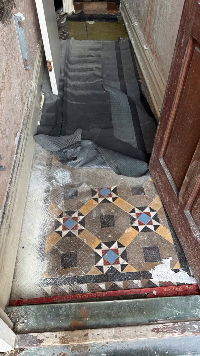 Original Victorian encaustic tiled hallway uncovered during a four-bed house refurbishment in Cardiff